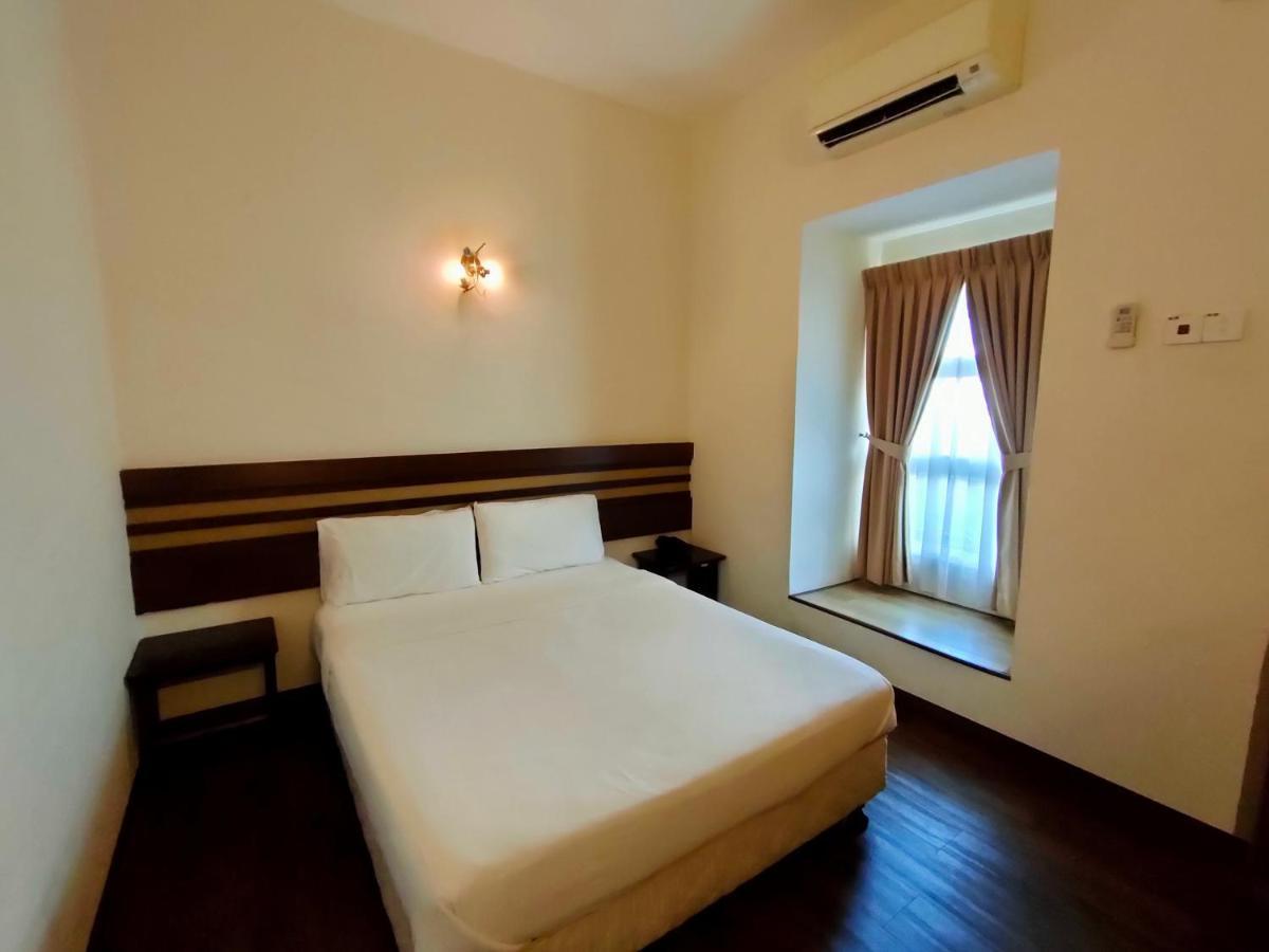 Cozzy Motel Malacca Bagian luar foto