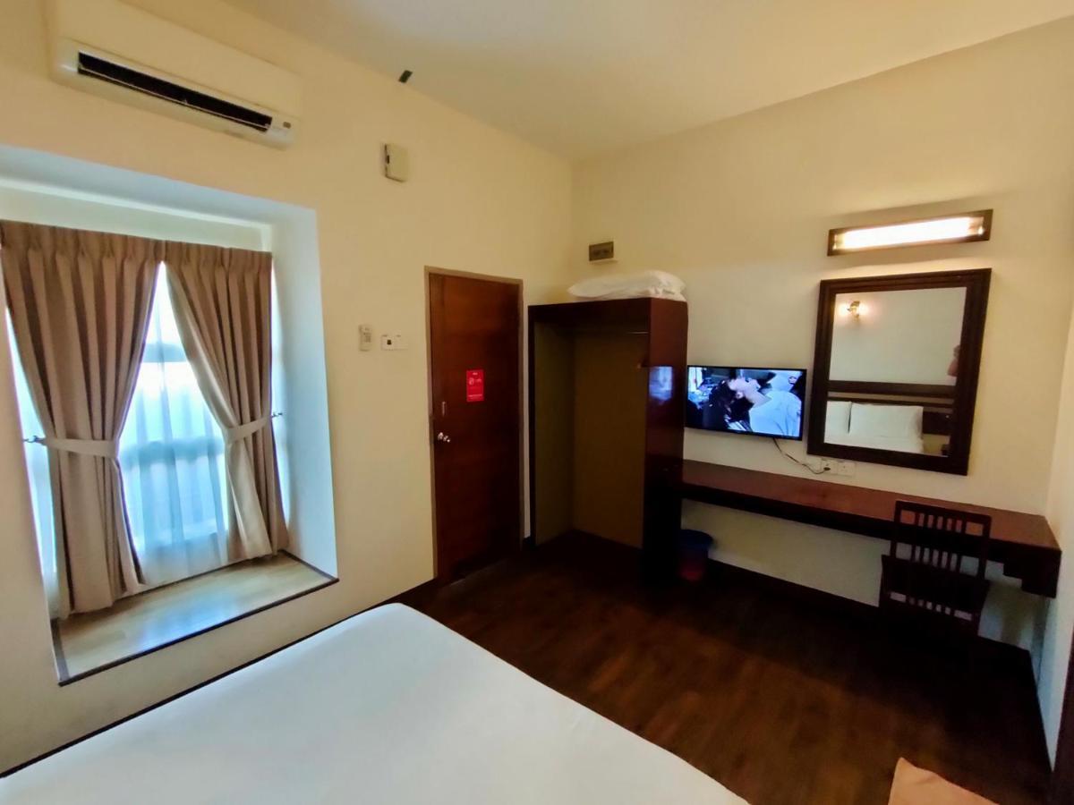 Cozzy Motel Malacca Bagian luar foto