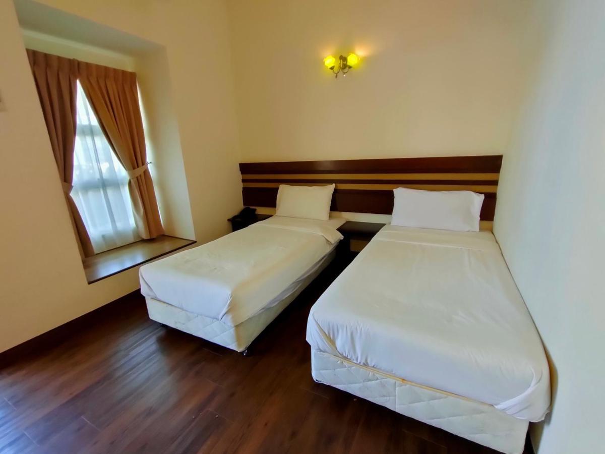 Cozzy Motel Malacca Bagian luar foto