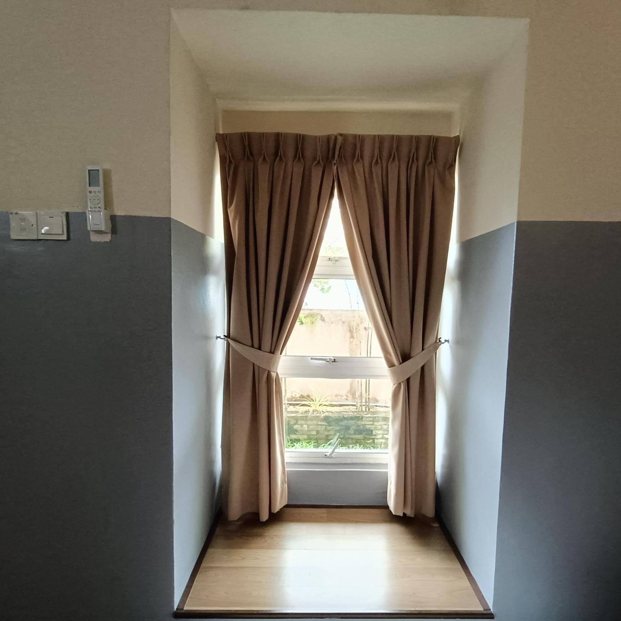 Cozzy Motel Malacca Bagian luar foto